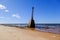 Ruins of the ancient Kurmrags lighthouse on the shore of the Gulf of Riga. Stone masonry in the lower part of the