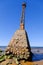 Ruins of the ancient Kurmrags lighthouse on the shore of the Gulf of Riga. Stone masonry in the lower part of the