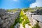 The ruins of ancient Thira, a prehistoric village at the top of the mountain Mesa Vouno, Santorini