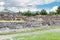 Ruins of the architecturally significant Mesoamerican pyramids and green grassland located at at Teotihuacan, an ancient