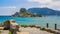 Ruins of the Basilica St. Stefanos in front of beautiful Island Kastri - beautiful coast scenery of Kos, Greece