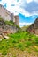 Ruins of Boskovice castle - view of surrounding walls and tower. Summer day, blue sky. Tourism in the Czech Republic - ancient