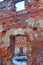 Ruins brick house ruined window door dips remained only the outer walls in the center of the wasteland snow