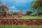 Ruins of buddha statues and pagoda of Wat Ratcha Burana in Ayutthaya historical park, Thailand