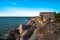 Ruins of bunkers on the beach of the Baltic sea, part of an old fort