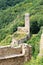 Ruins of the castle Philippsburg on a hill spur above Eifel village of Monreal, Germany