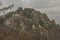 Ruins of castle Vrsatec in spring dark cloudy day