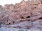 Ruins and caves of the ancient city in the rocks in Petra, the former capital of Jordan