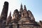 Ruins of the central chedi stupa at Wat Mahathat with its classic lotus-bud spire, Sukhothai Historical Park, Thailand