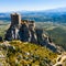 Ruins of Chateau de Queribus on rocky hilltop in summer, France