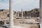 Ruins and columns in the Theatre Quarter on the island of Delos, Greece