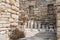 Ruins and columns in the Theatre Quarter on the island of Delos, Greece