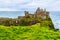 Ruins of Dunluce castle on the cliffs of the Atlantic Ocean in Northern Ireland