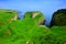 Ruins of Dunseverick Castle atop green cliffs of the Causeway Coast, Northern Ireland