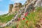 Ruins of the Enisala fortress with red poppies near its walls. Olso referred to as Heracleea Fortress, near Razim lake.