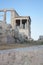 Ruins featuring stately stone pillars and majestic arches