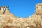 Ruins of a fortification against the blue sky.