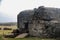 Ruins of german bunker in the beach of Normandy, France