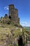 Ruins of Hazmburk castle on the hill with cellar portal