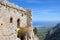 Ruins of historical Saint Hilarion Castle in Northern Cyprus overlooking the Mediterranean sea and its coast by the city Kyrenia.