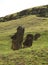 The ruins of huge Moai on the slope of Rano Raraku volcano, Rapa Nui national park on Easter Island, Chile