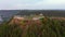 The ruins of Kremenets Castle on a hill from a bird`s eye view. Filmed in UHD 4k drone video