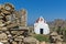 The ruins of a medieval fortress and White church, Mykonos island, Greece