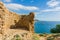 Ruins of medieval tower and sea view.