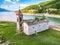 Ruins of not flooded Old Mavrovo Church in summer by Mavrovo Lake in North Macedonia