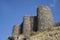 Ruins of an old castle. Entrance door and window of an old castle. Fortress towers and walls