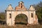 Ruins of old deserted baroque gateway