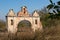 Ruins of old deserted baroque gateway