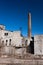 Ruins of an old factory with a chimney