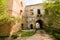 Ruins of the old Klevan castle. Ruined wall with windows against the blue sky. Courtyard. Rivne region. Ukraine