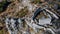 Ruins of old medieval village of Greolieres, drone aerial view of church, Alpes Maritimes, France