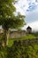 Ruins of the old stone Hussite redoubt form behind walls in LÃº