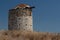 Ruins of the old windmill in Kefalos village on Kos island, Greece