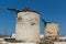 Ruins of old windmils in town of Ano Mera, island of Mykonos, Greece