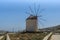 Ruins of old windmils in town of Ano Mera, island of Mykonos, Greece