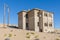 Ruins of once prosperous German mining town Kolmanskop in the Namib desert near Luderitz, Namibia, Southern Africa