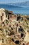 Ruins over caldera in Oia village, Greece