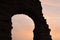 Ruins at the park of the aqueducts in Rome at sunset, Italy