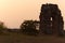 Ruins at the park of the aqueducts in Rome at sunset, Italy