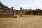 Ruins and a portion of the Kalyana Mandapa on the right side, near the North Gopura of the inner courtyard, Achyuta Raya temple, H