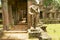 Ruins of the Preah Khan Temple with the beheaded state in Siem Reap, Cambodia.