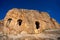 Ruins of rock cut building in Dara ancient city. Mardin, Turkey