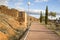 Ruins of a rustic ancient house and a pedestrian path at Torrehermosa village, Zaragoza, Spain