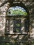 Ruins of Saliena lutheran church, Latvia. Beautiful arched window with broken glass