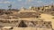 Ruins on the South side of the Avenue of Sphinxes leading to the first pylon of the Karnak Temple in Luxor, Egypt.