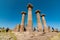 Ruins of Temple of Athena with tourists in Assos ancient city